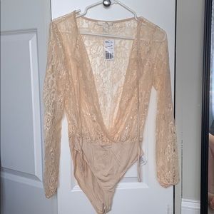 Cream laced body suit